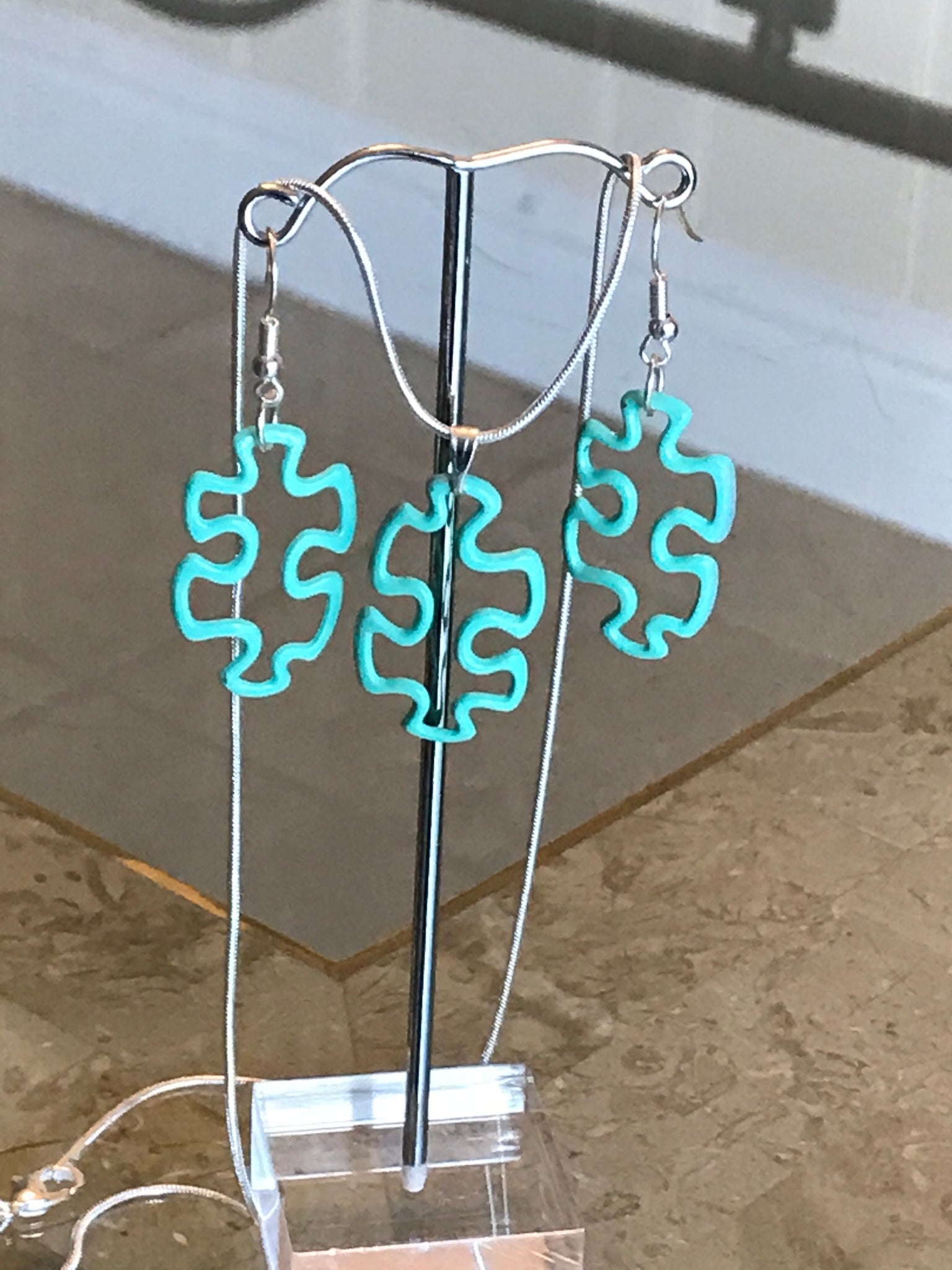 Colored puzzle piece necklace set