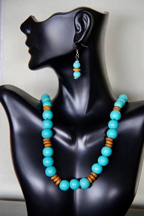 Aqua and beige colored disc wooden beads