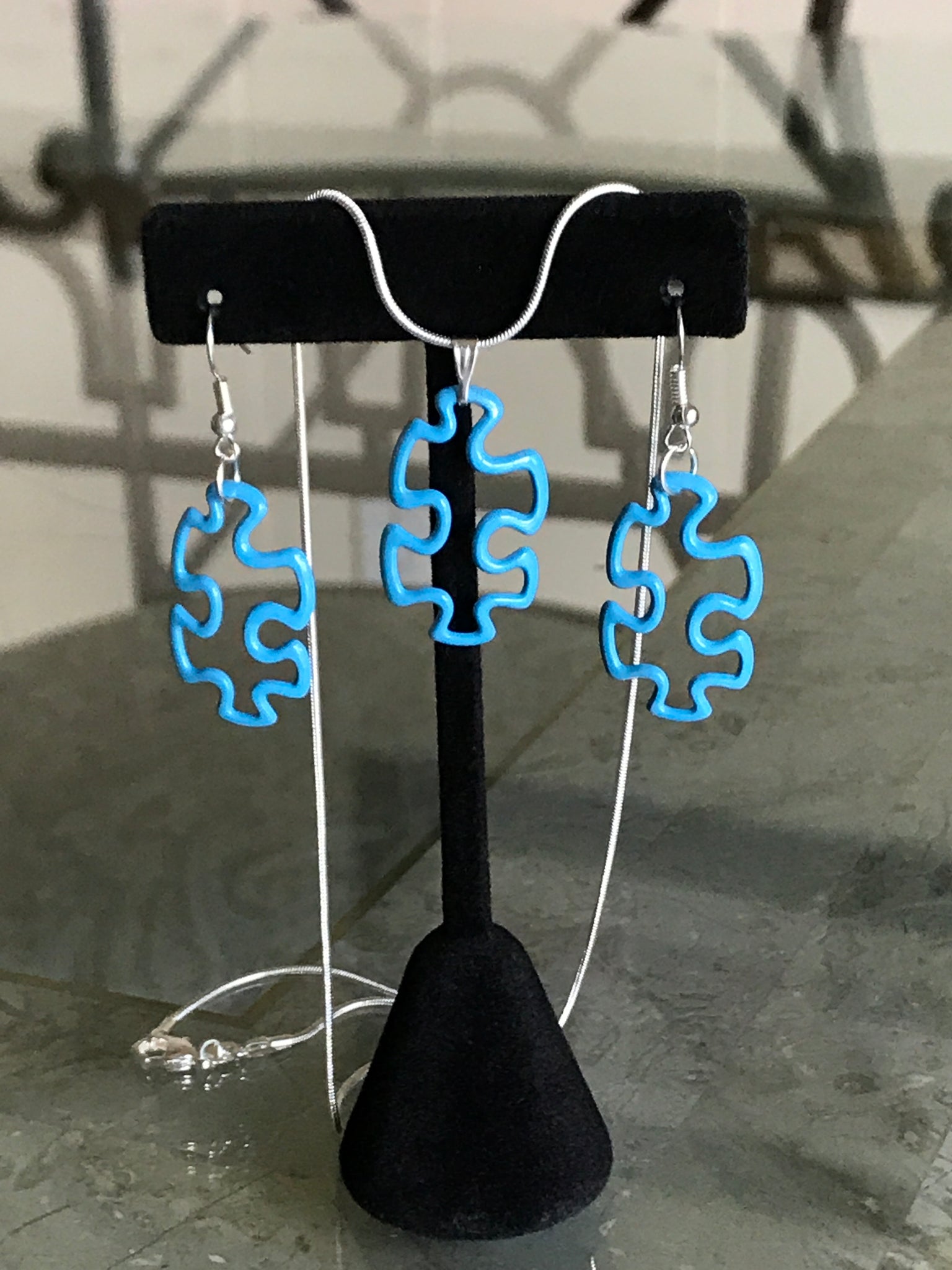 Colored puzzle piece necklace set