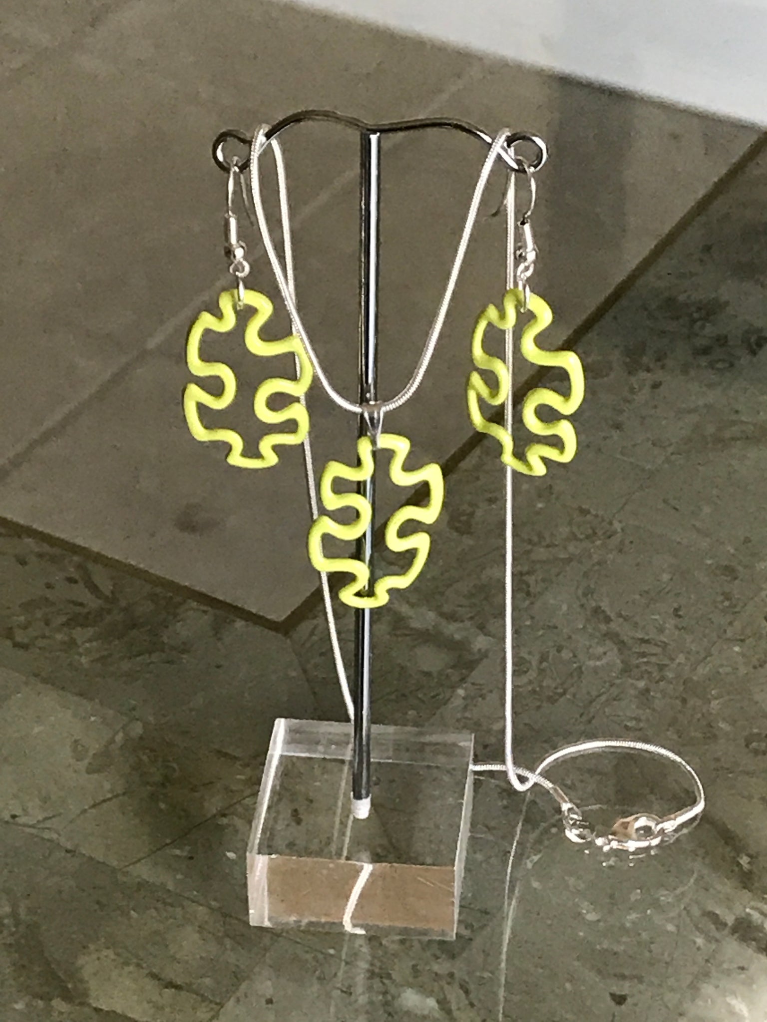 Colored puzzle piece necklace set
