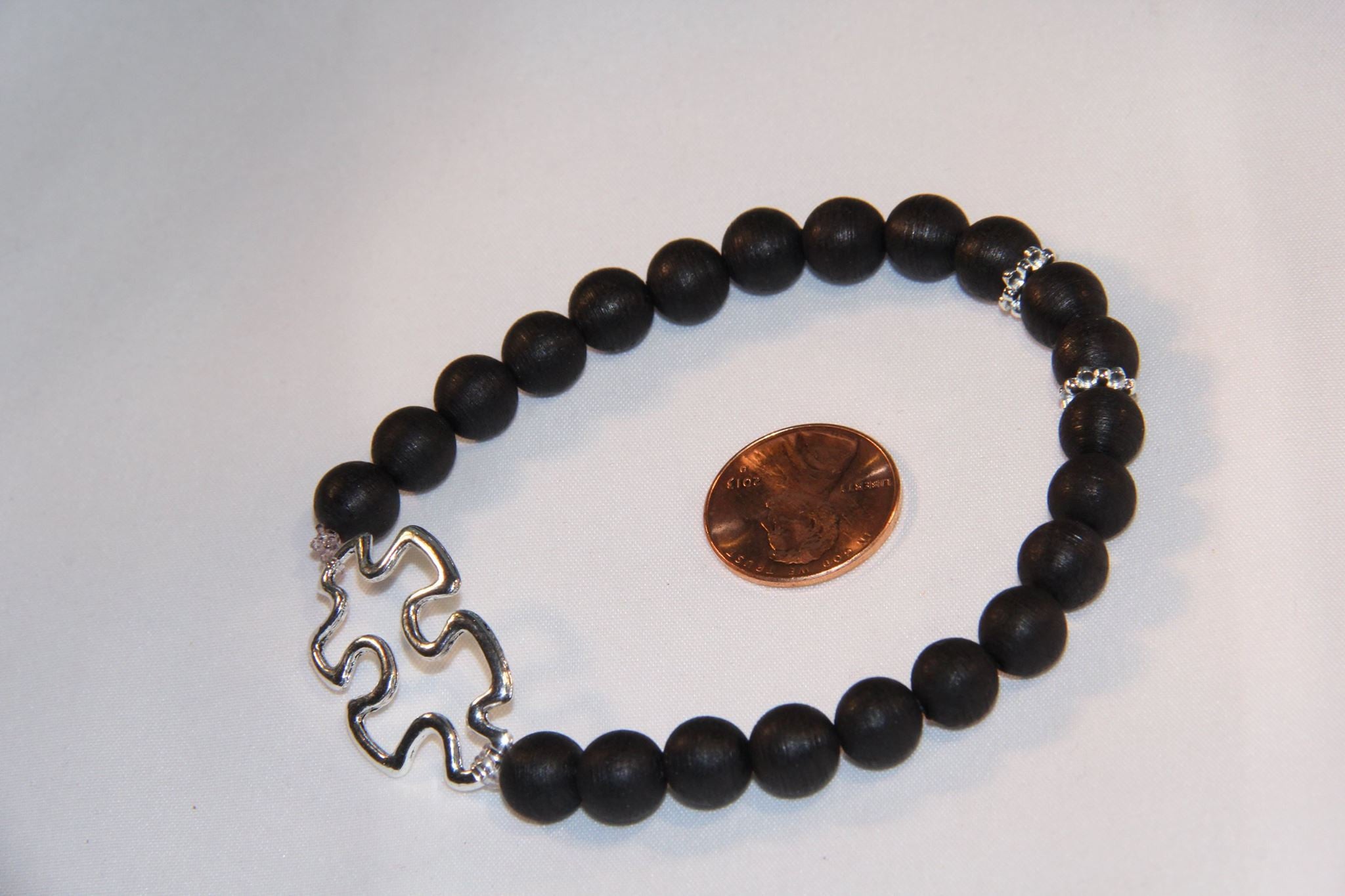 Black wood bracelet with Autism charm