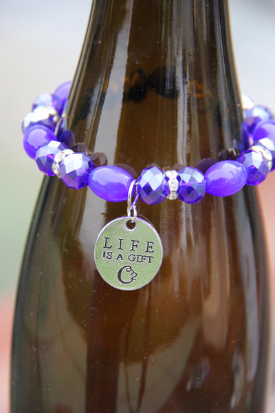 Navy blue glass beads with "Life is a gift" silver charm bottle bracelet