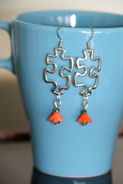 Puzzle piece ear rings Silver orange flower