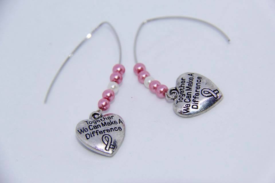 Ear rings with "Together We Can Make a Difference" charm