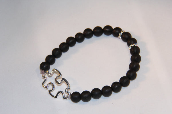 Black wood bracelet with Autism charm