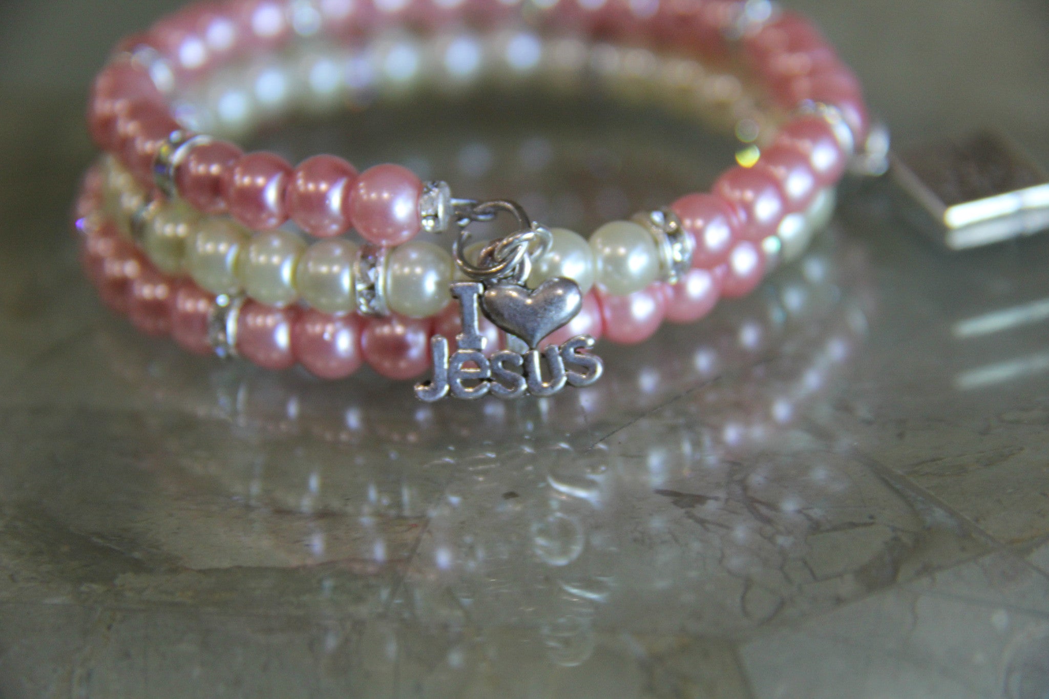 Spring bracelet made with pink and white glass pearl beads