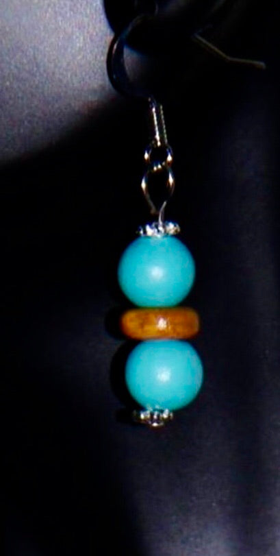 Aqua and beige colored disc wooden beads