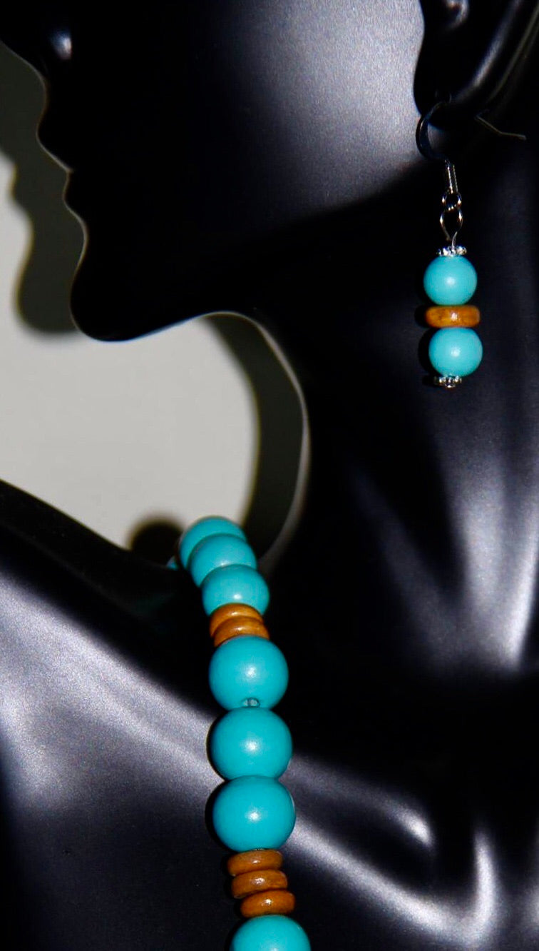 Aqua and beige colored disc wooden beads